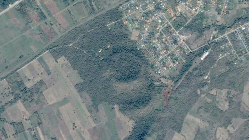 An satellite image showing the outline of a caldera of an extinct volcano.